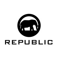 Black elephant silhouette in a circle, text