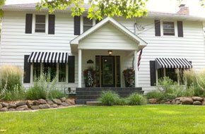 Residential black and white awnings