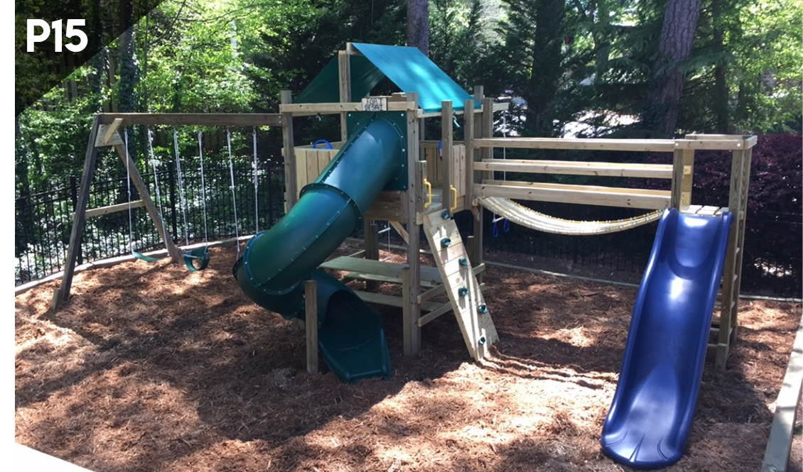 A playground set with a blue slide and a green slide
