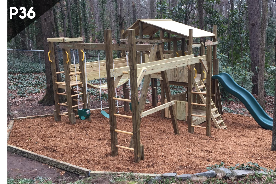 A wooden playground with a slide and swings in the woods.