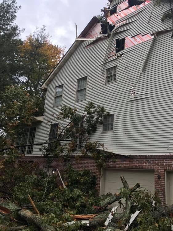 a house that has been damaged by a storm