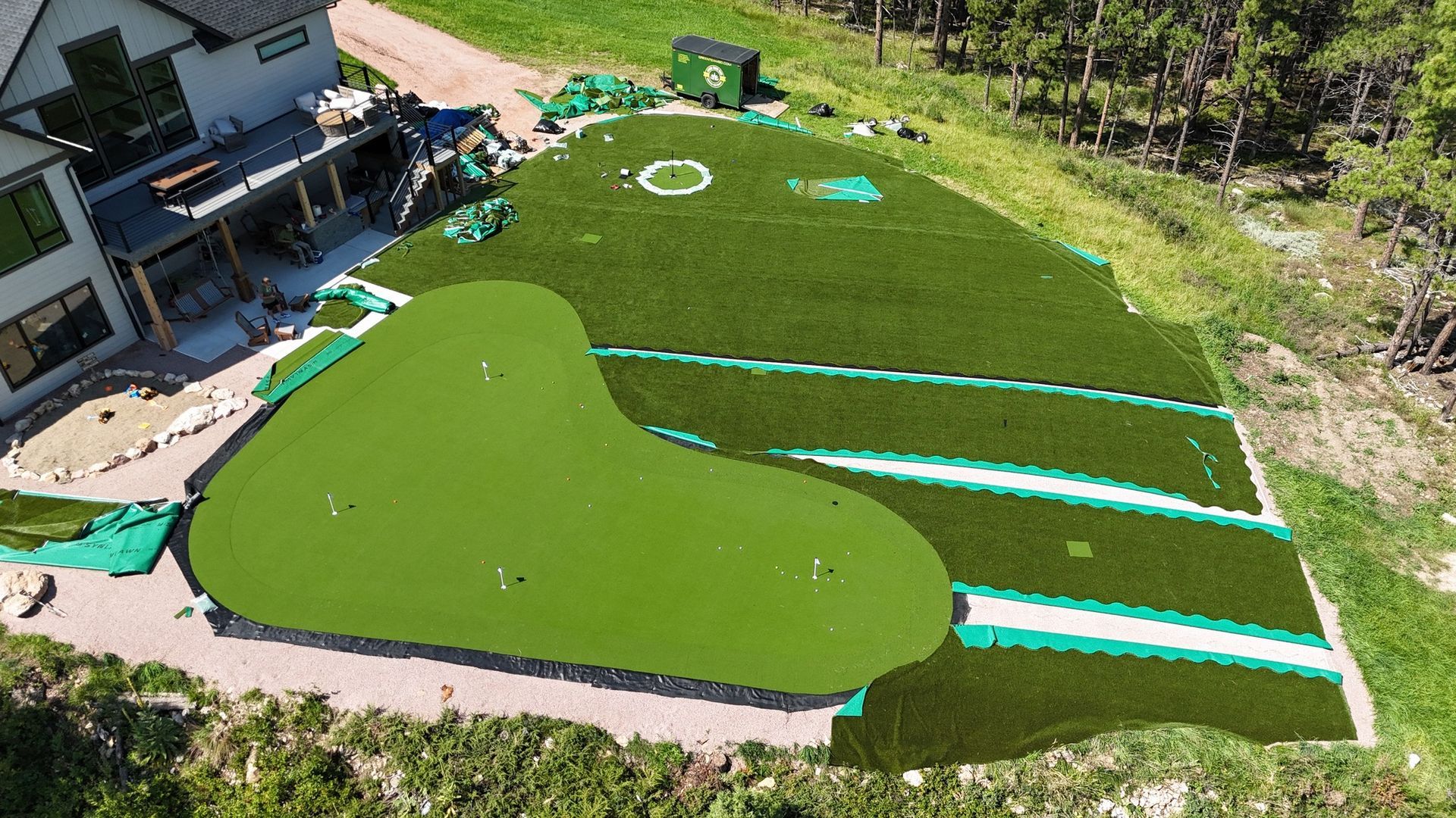 Aerial view of a custom putting green installation