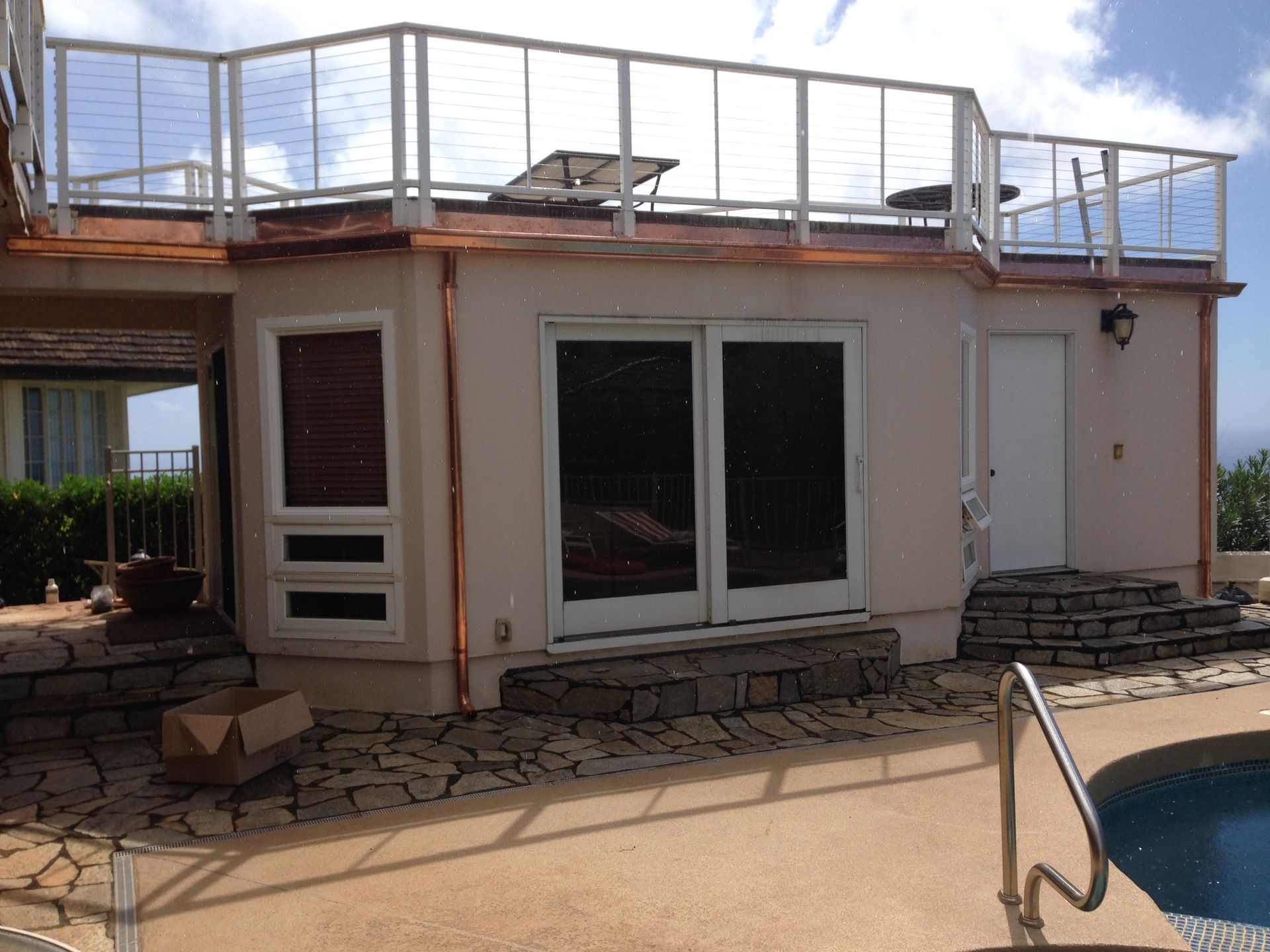 House with a deck and a pool