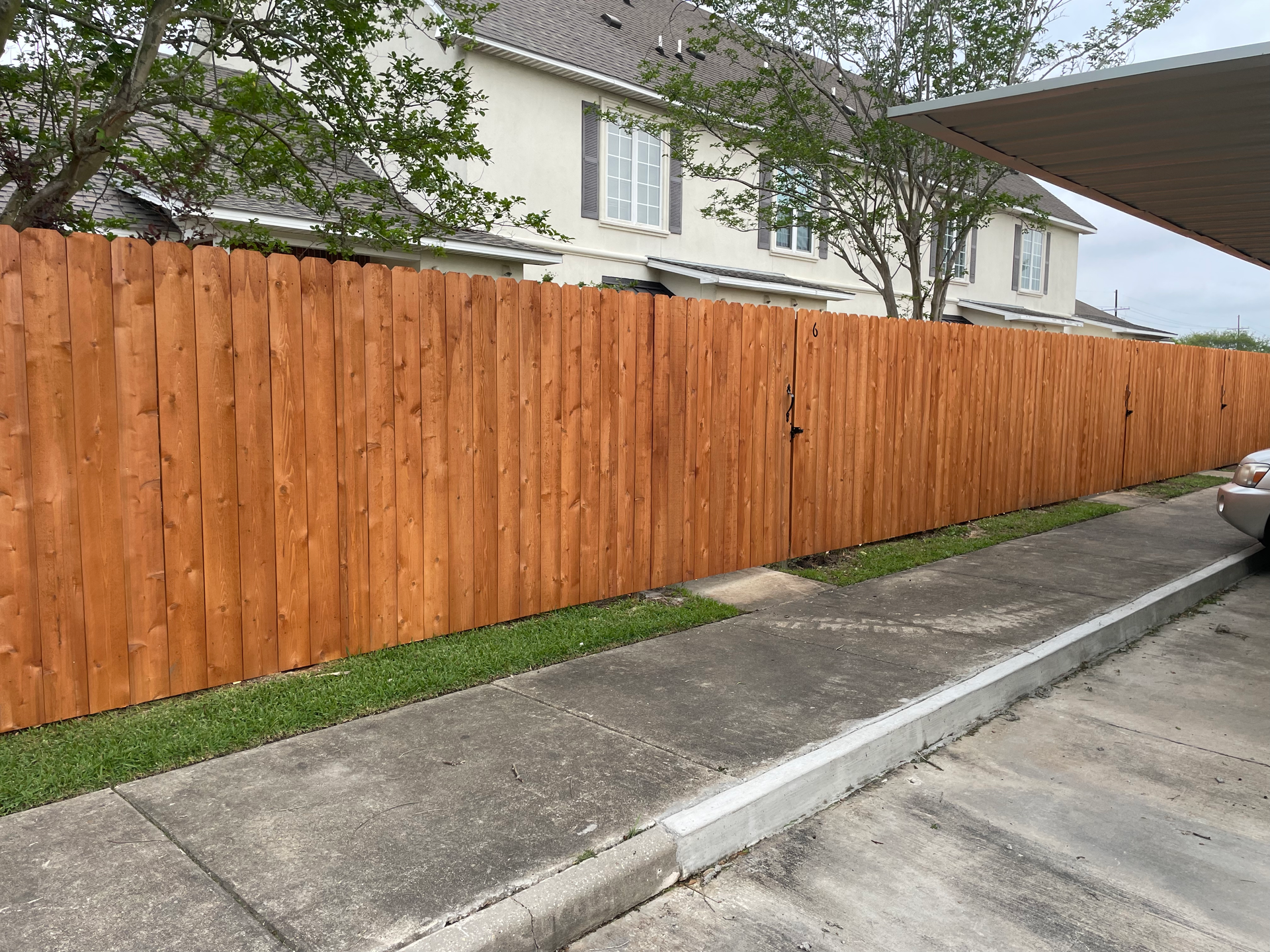 Wooden fence next to a house