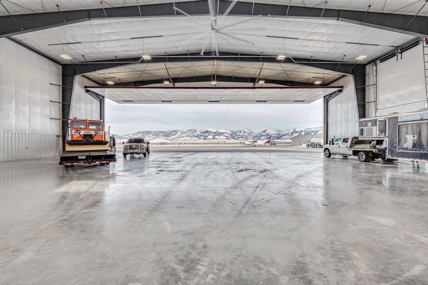 A large, empty aircraft hangar