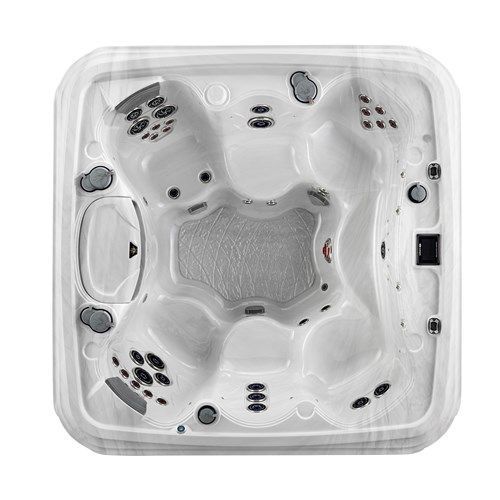 Top-down view of a white square hot tub with multiple seats and jets