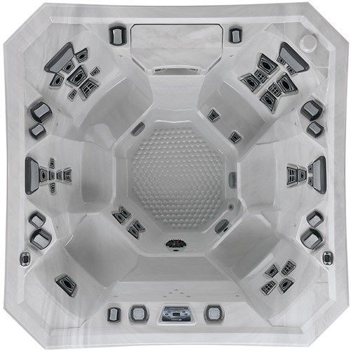 Top-down view of a white hexagonal hot tub with multiple jets and built-in seats