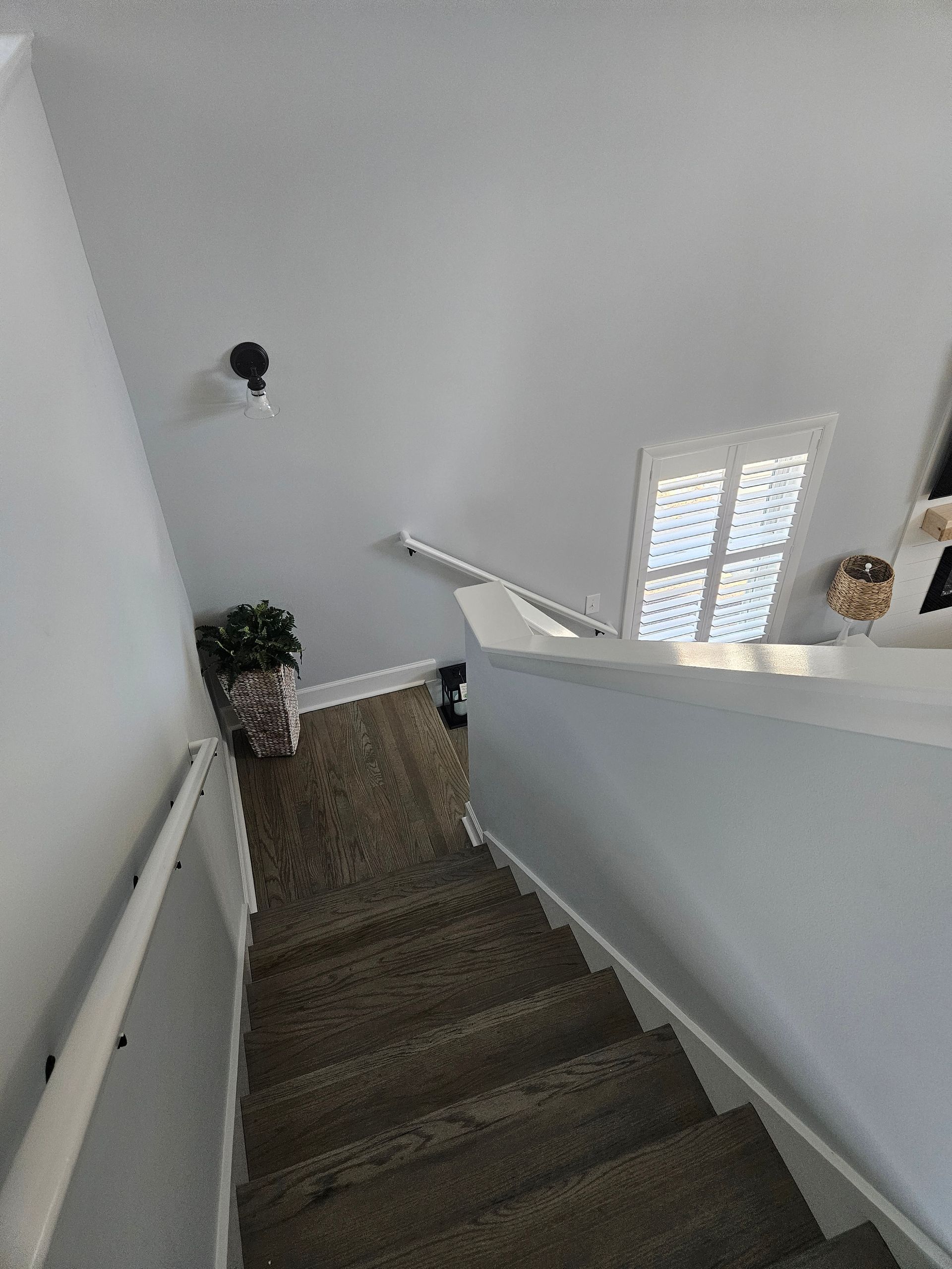 A staircase leading up to the second floor of a house