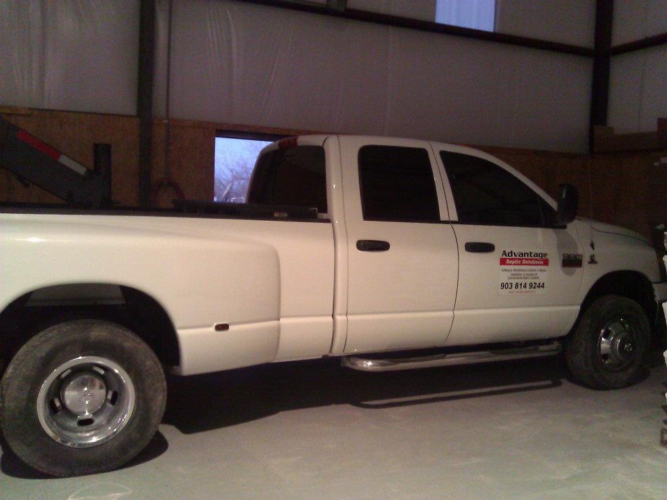 Advantage Septic Solutions white pick up truck
