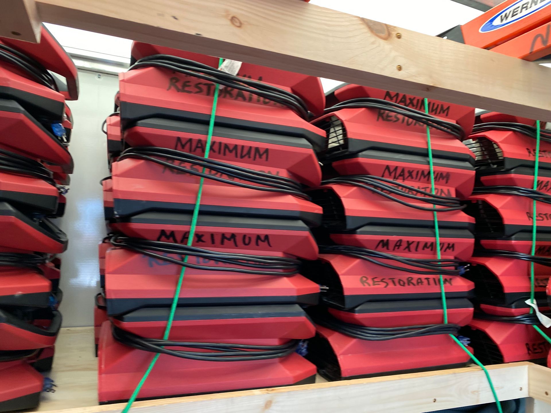 Stacked red and black restoration devices labeled 