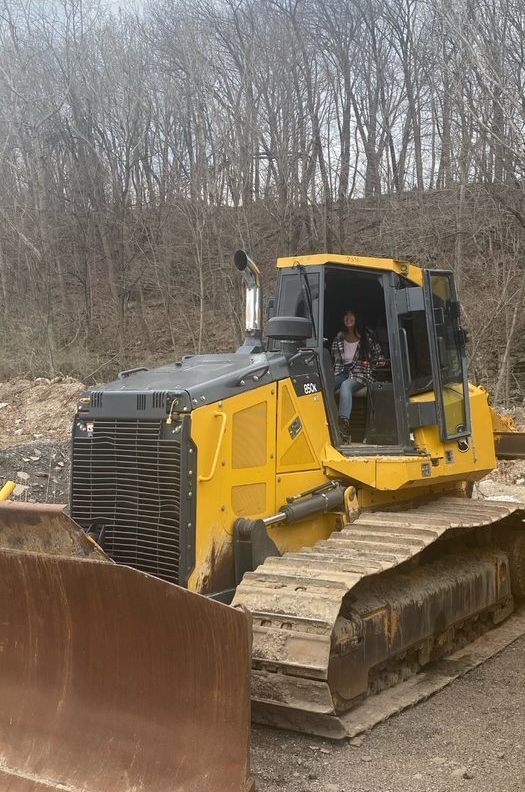 lady on a bulldozer