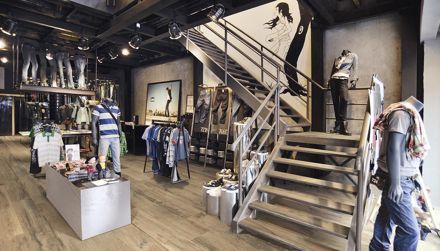 A store with stairs leading up to the second floor