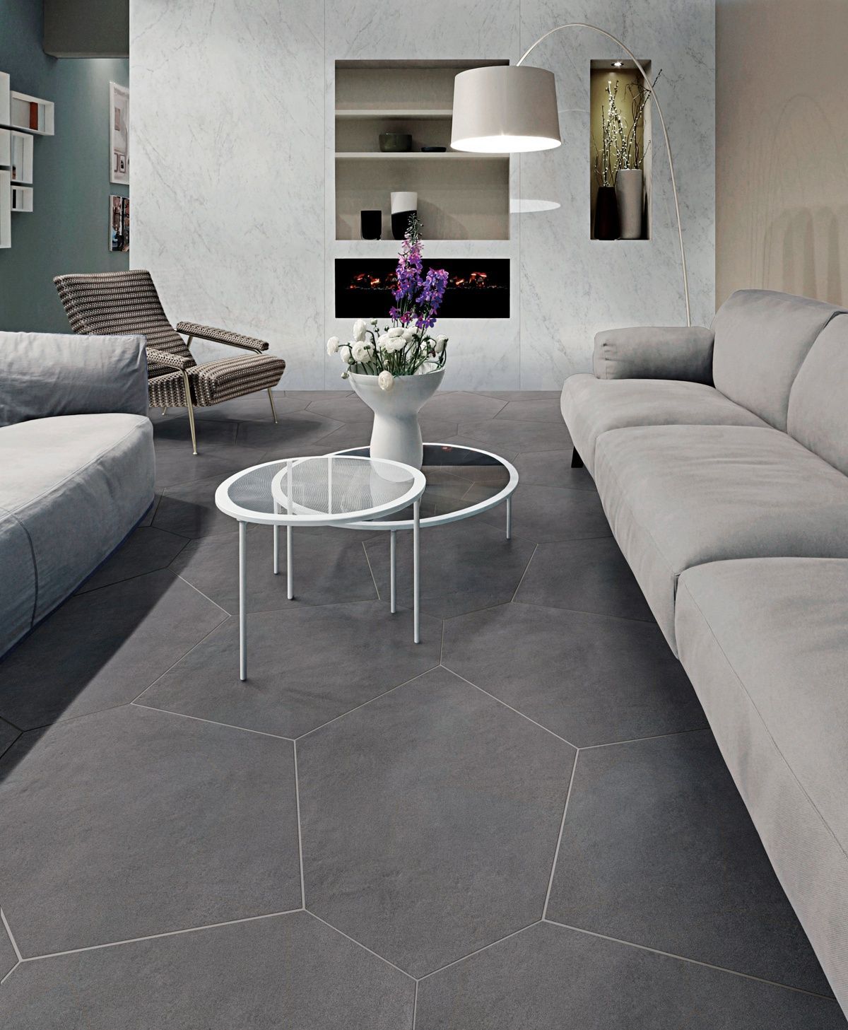 A living room with a couch and two coffee tables