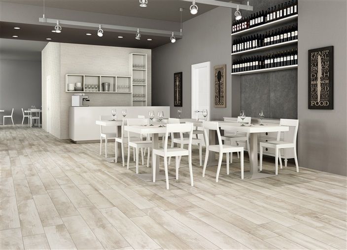 A dining room with tables and chairs in it