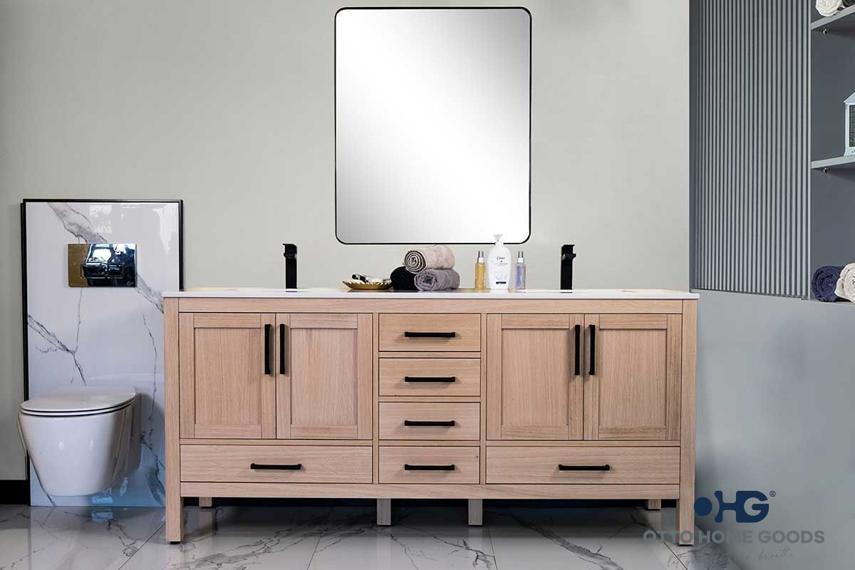 A bathroom with two sinks , a toilet , and a mirror.