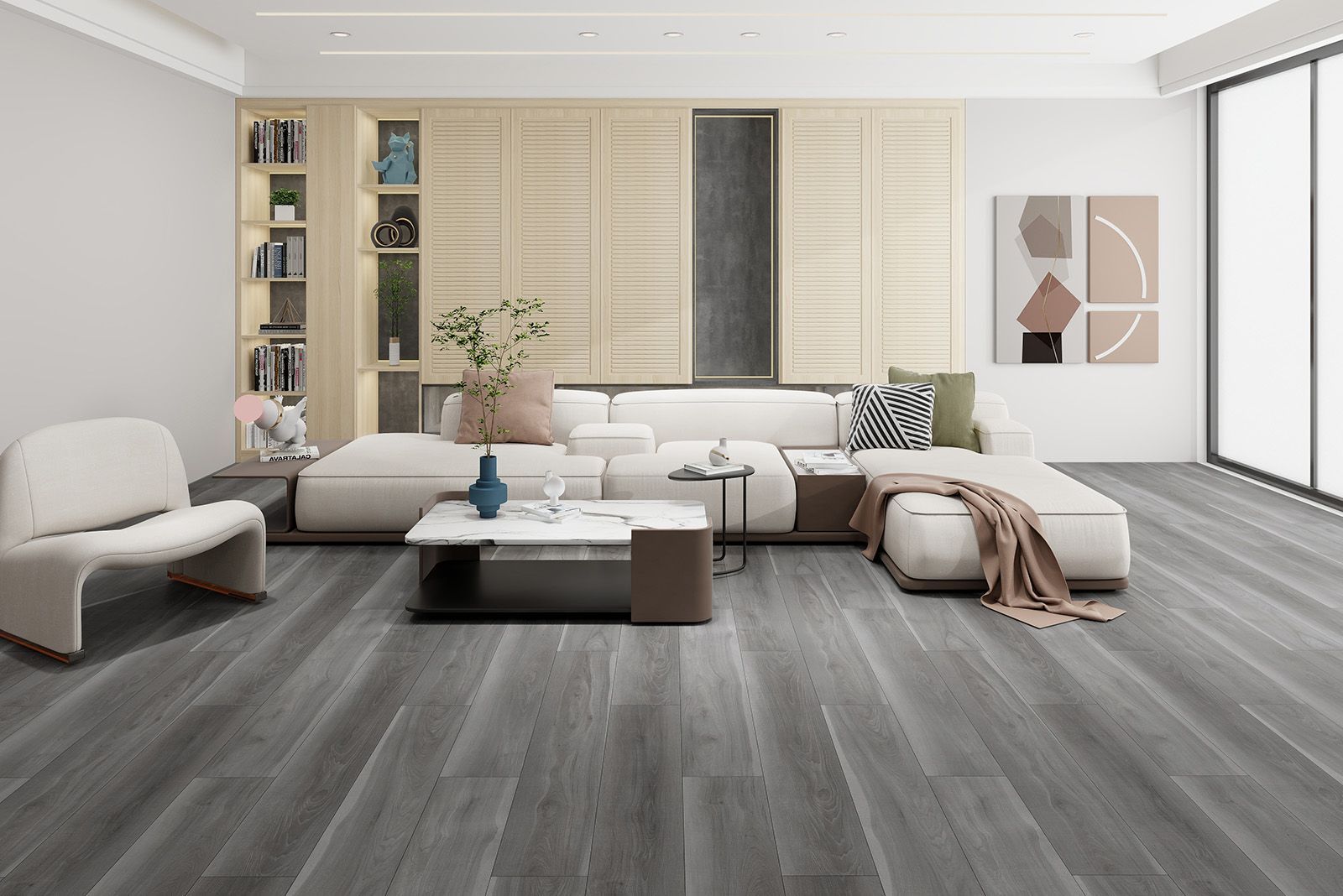 A living room with a couch , table , chairs and a large window.