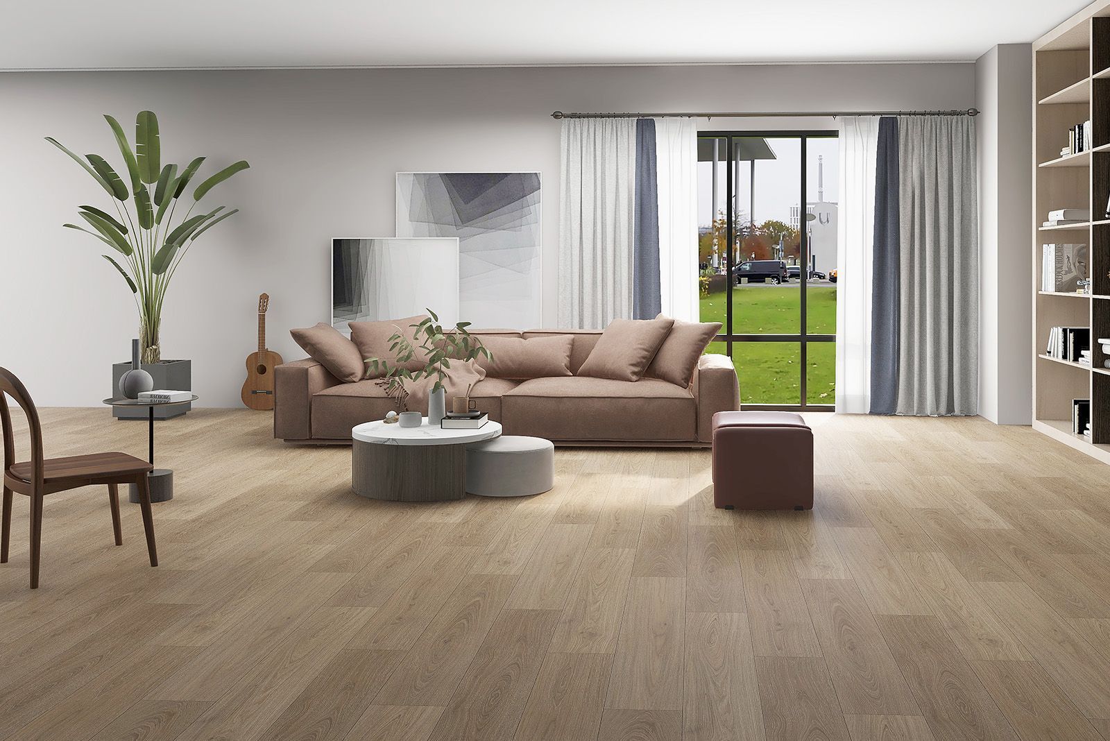A living room with a couch , table , chairs and a large window.