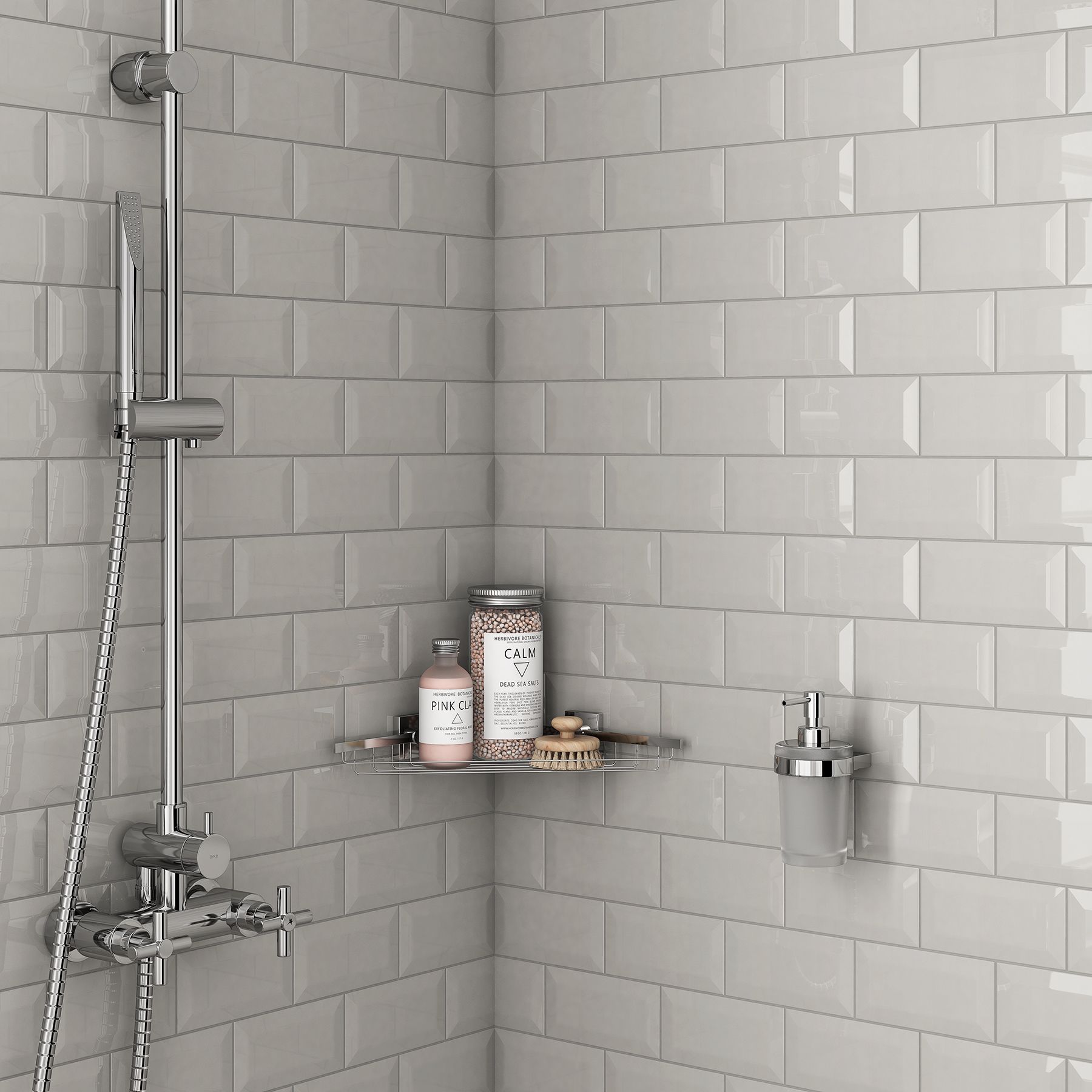 A shower with a corner shelf and a shower head.