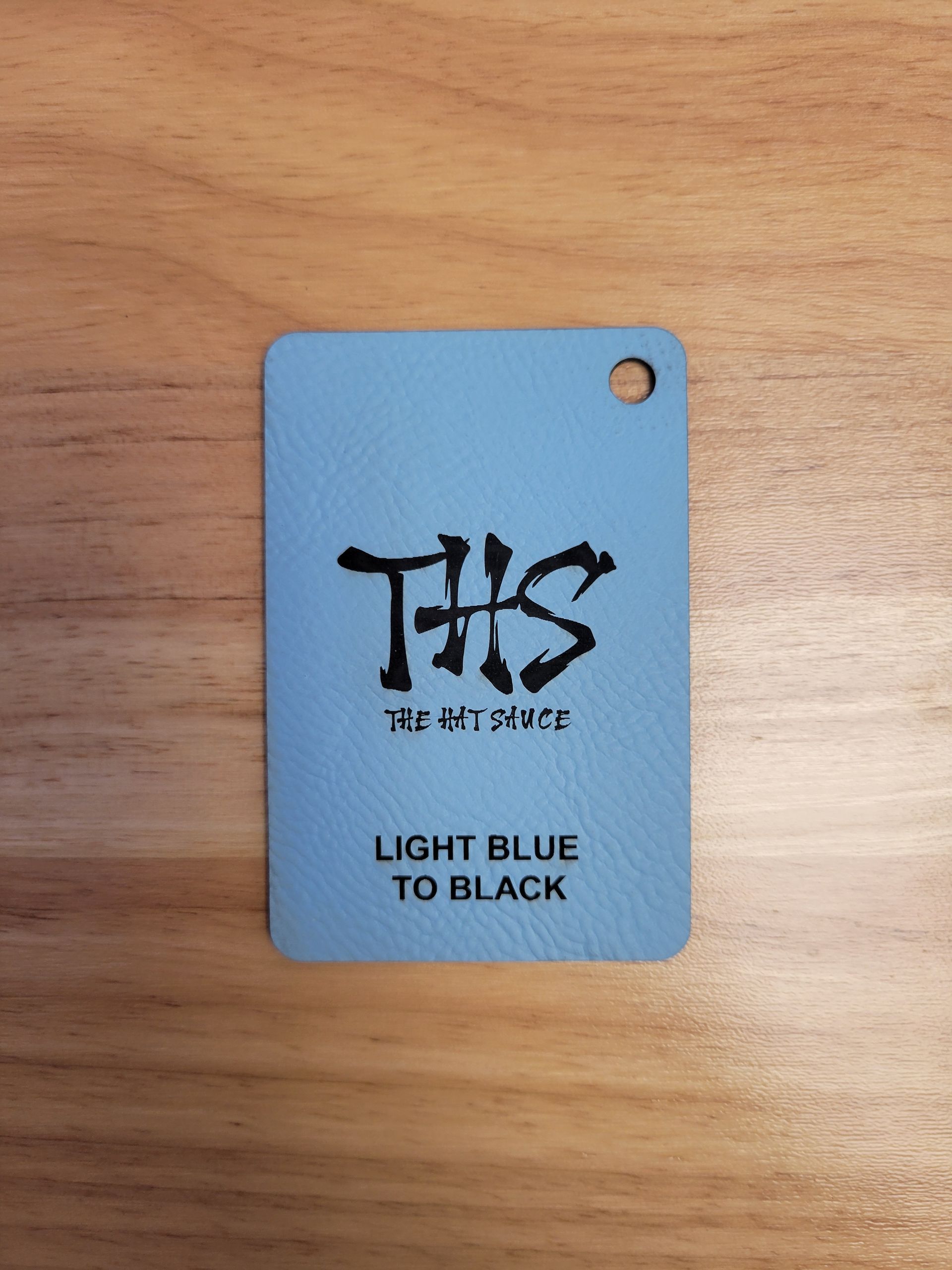 A light blue tag that says this on it