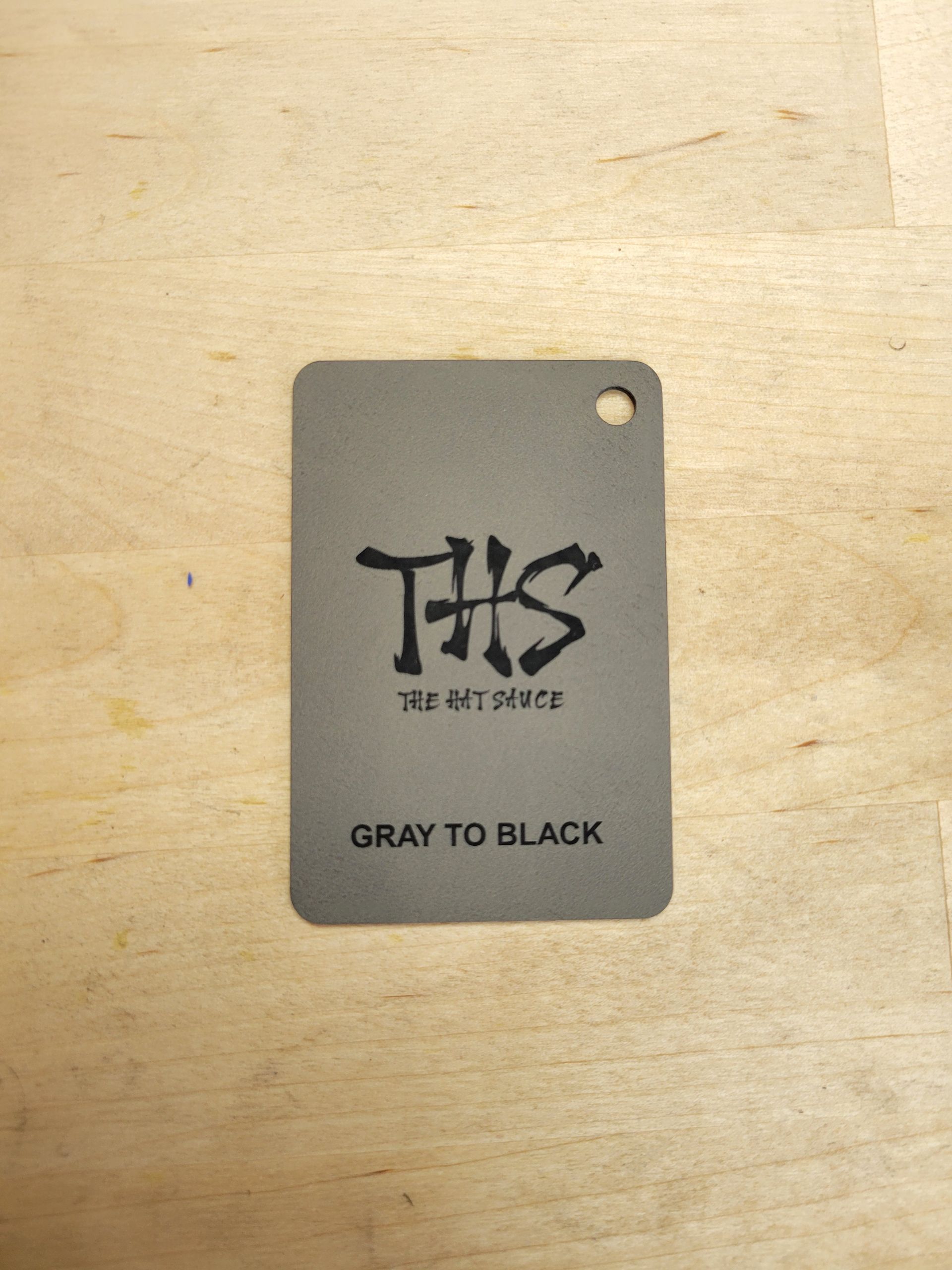 A tag that says this gray to black on it