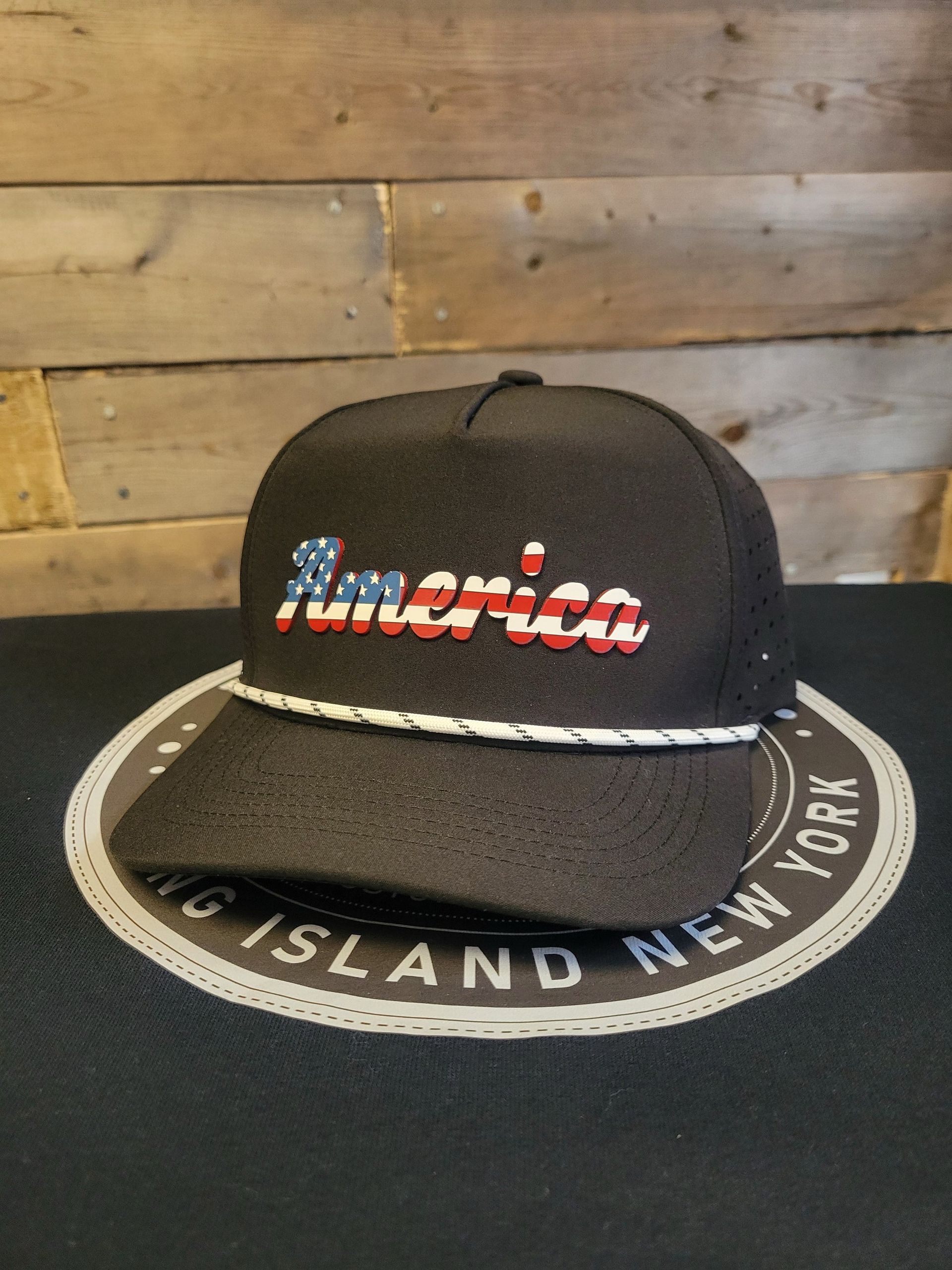 A black hat with the word america on it