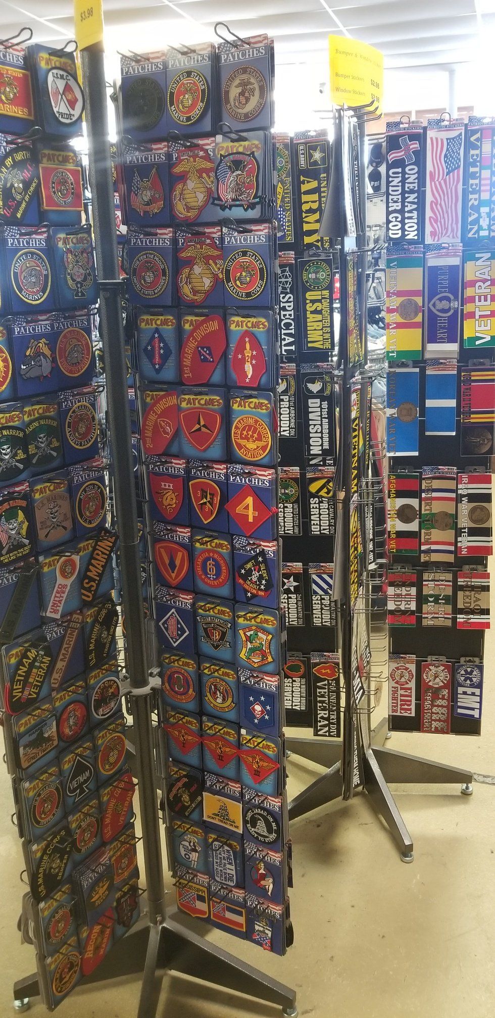 Large assortment of military patches and stickers