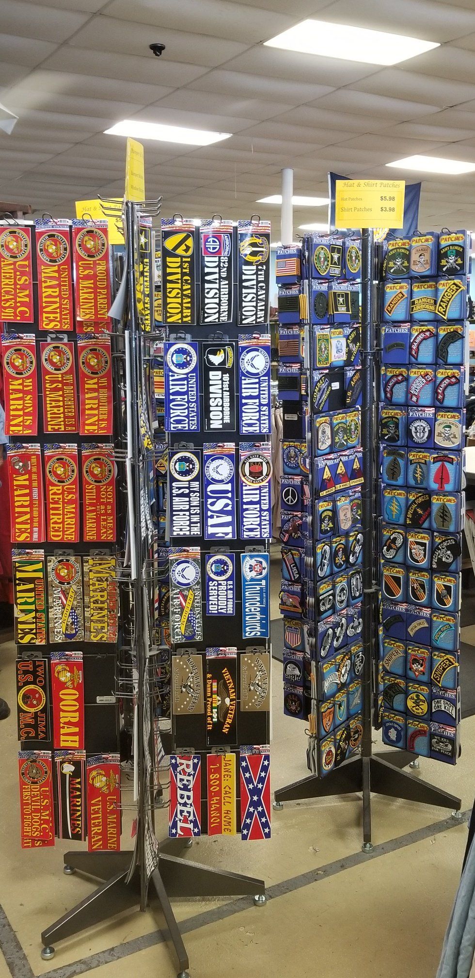 Large assortment of military patches and stickers