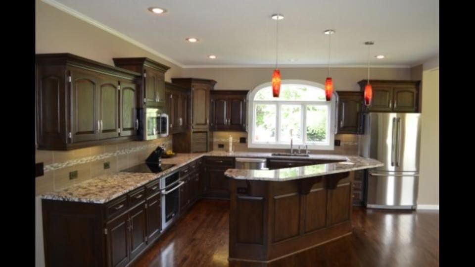 A kitchen with stainless steel appliances and granite counter tops