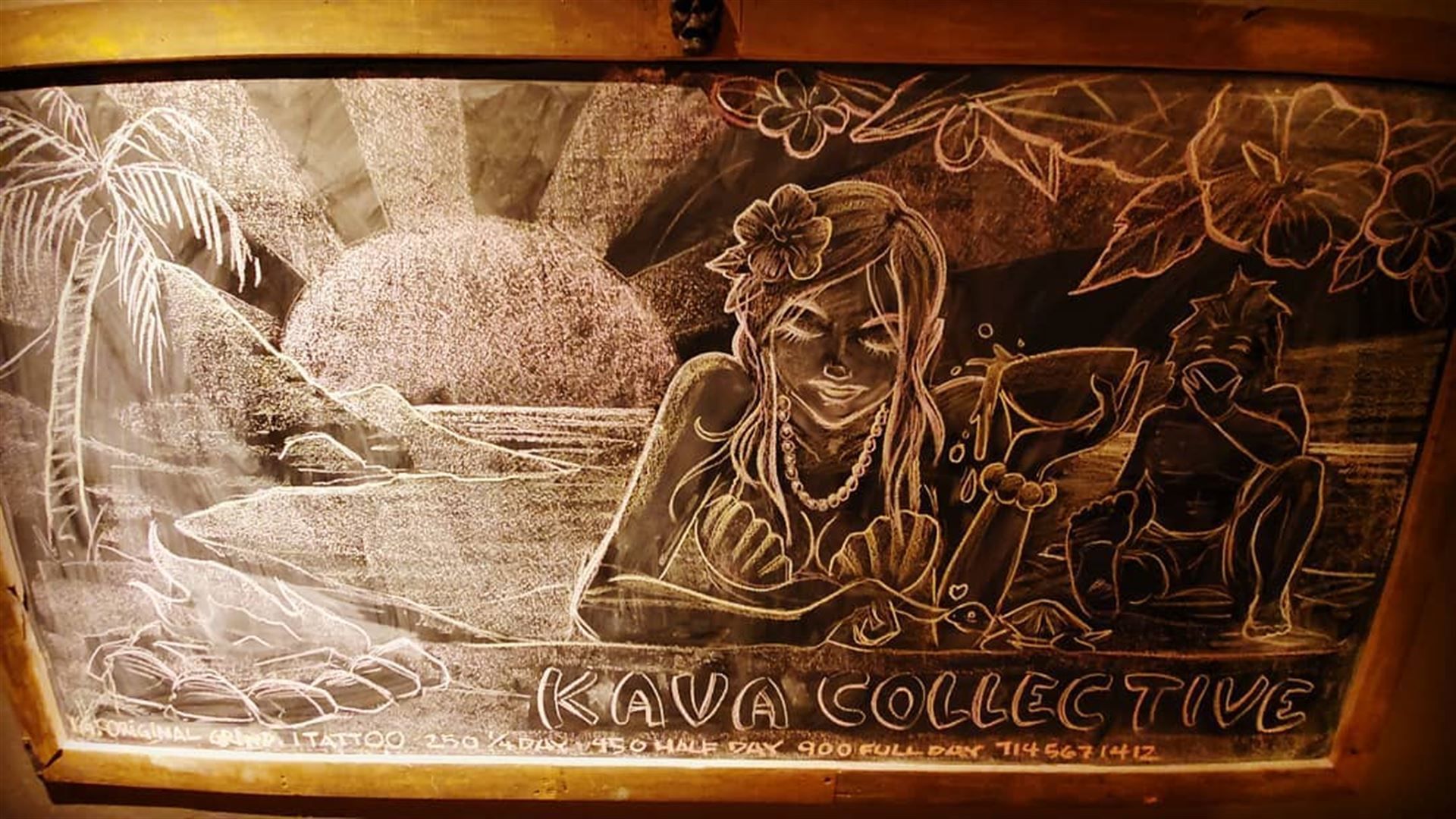 A black and white drawing of a woman sitting on a beach.