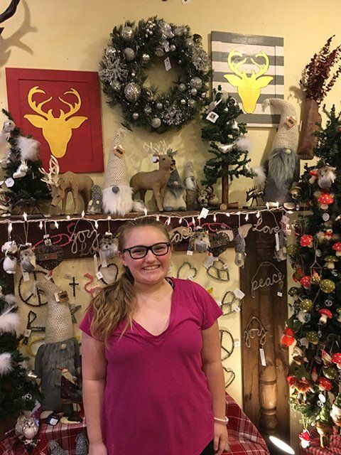 Woman and Christmas display