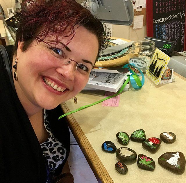 Woman and stones with drawings