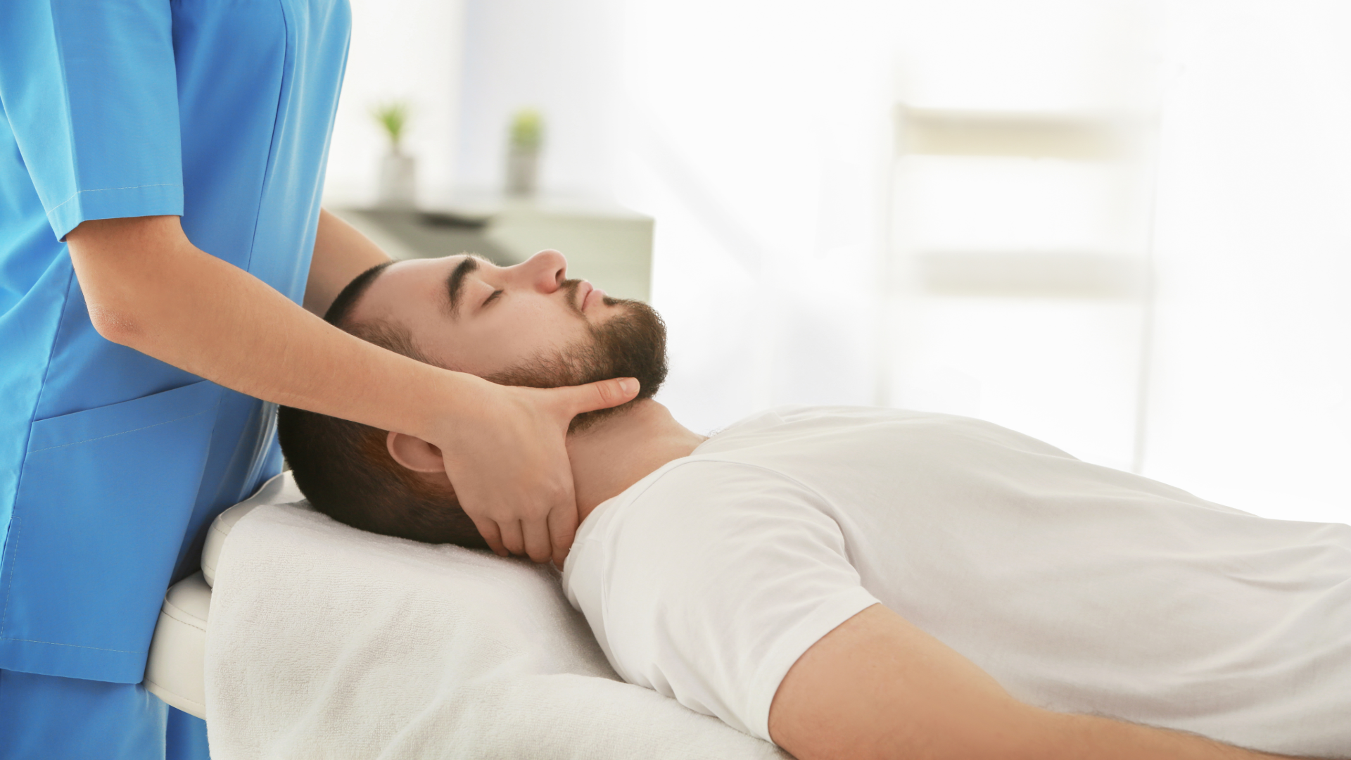 Chiropractor performing neck adjustment on a patient, showing how chiropractic works for pain relief