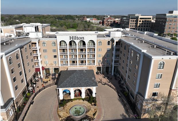 An aerial view of a large hilton hotel