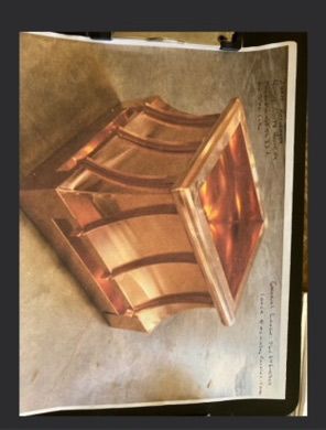 A picture of a copper planter is on a piece of paper