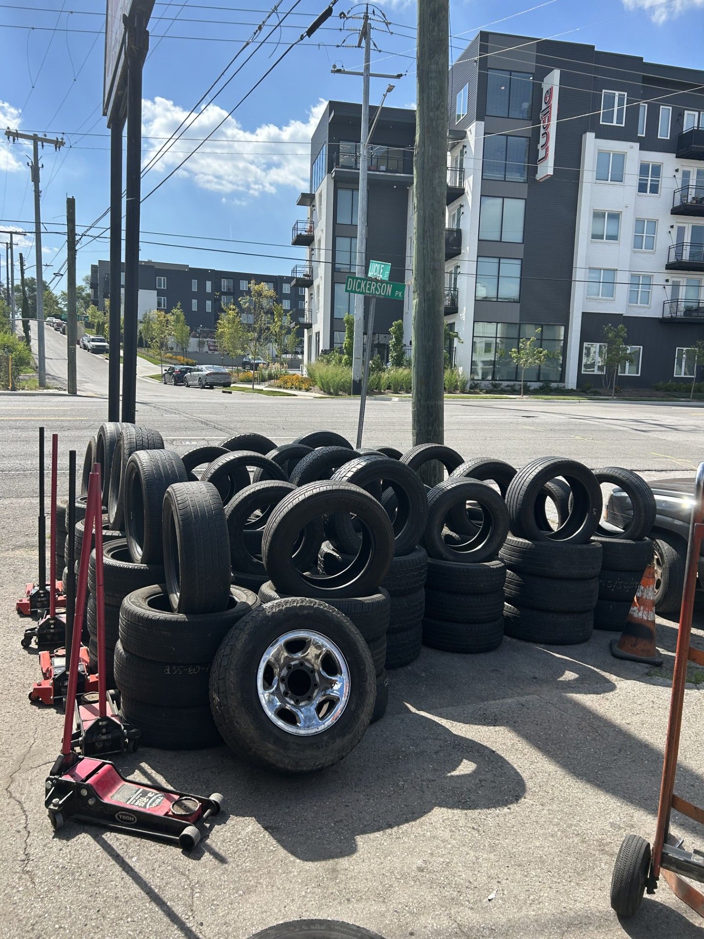 A bunch of tires are stacked on top of each other