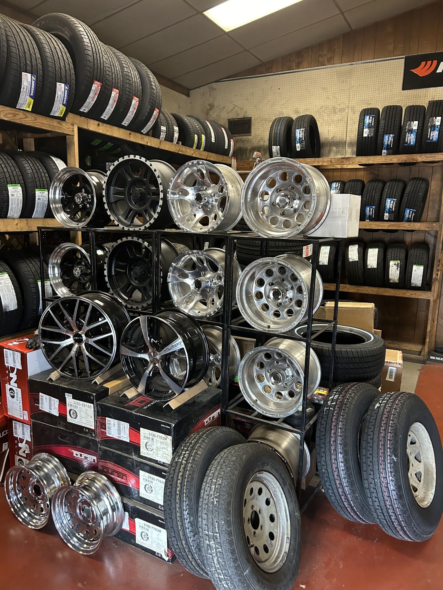 A store filled with lots of tires and wheels.