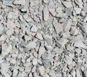 A pile of white gravel is sitting on the ground.