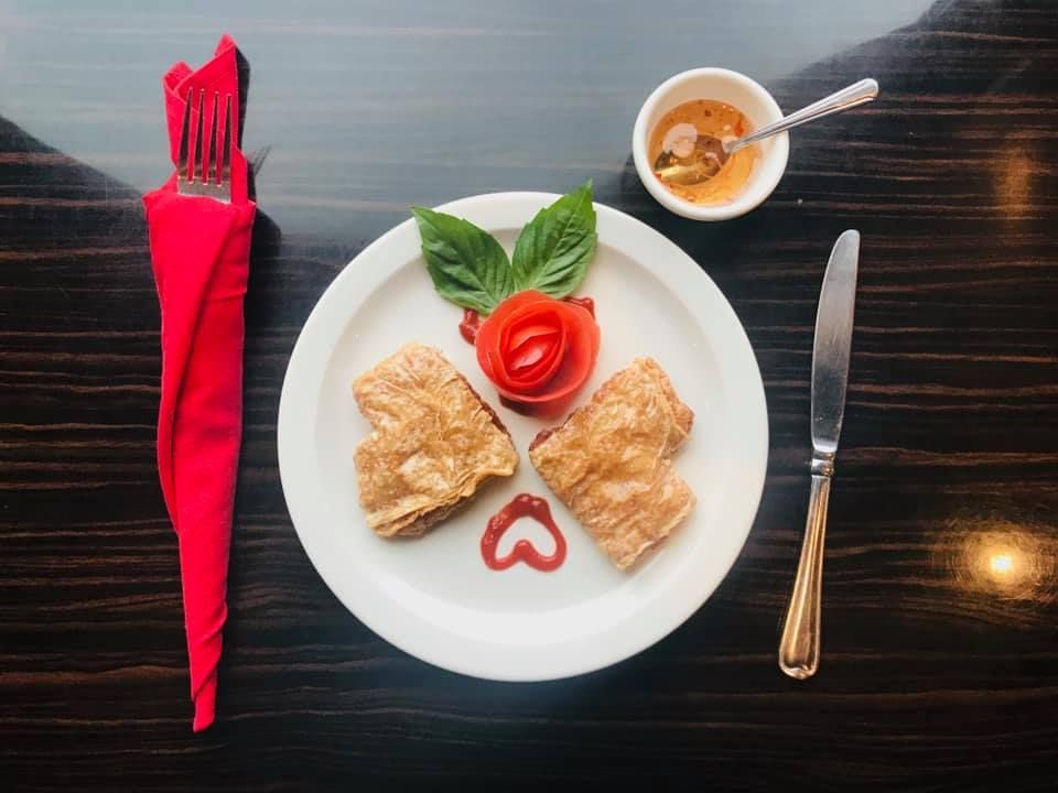 A plate of food with a heart on it