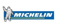 Michelin Man waving next to the Michelin logo in white text on a blue background.