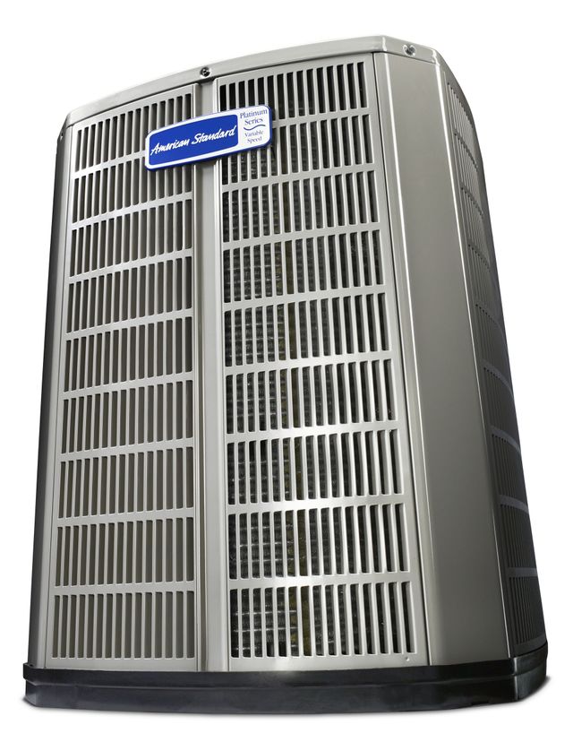 Large gray outdoor air conditioner unit with a blue label and front vents