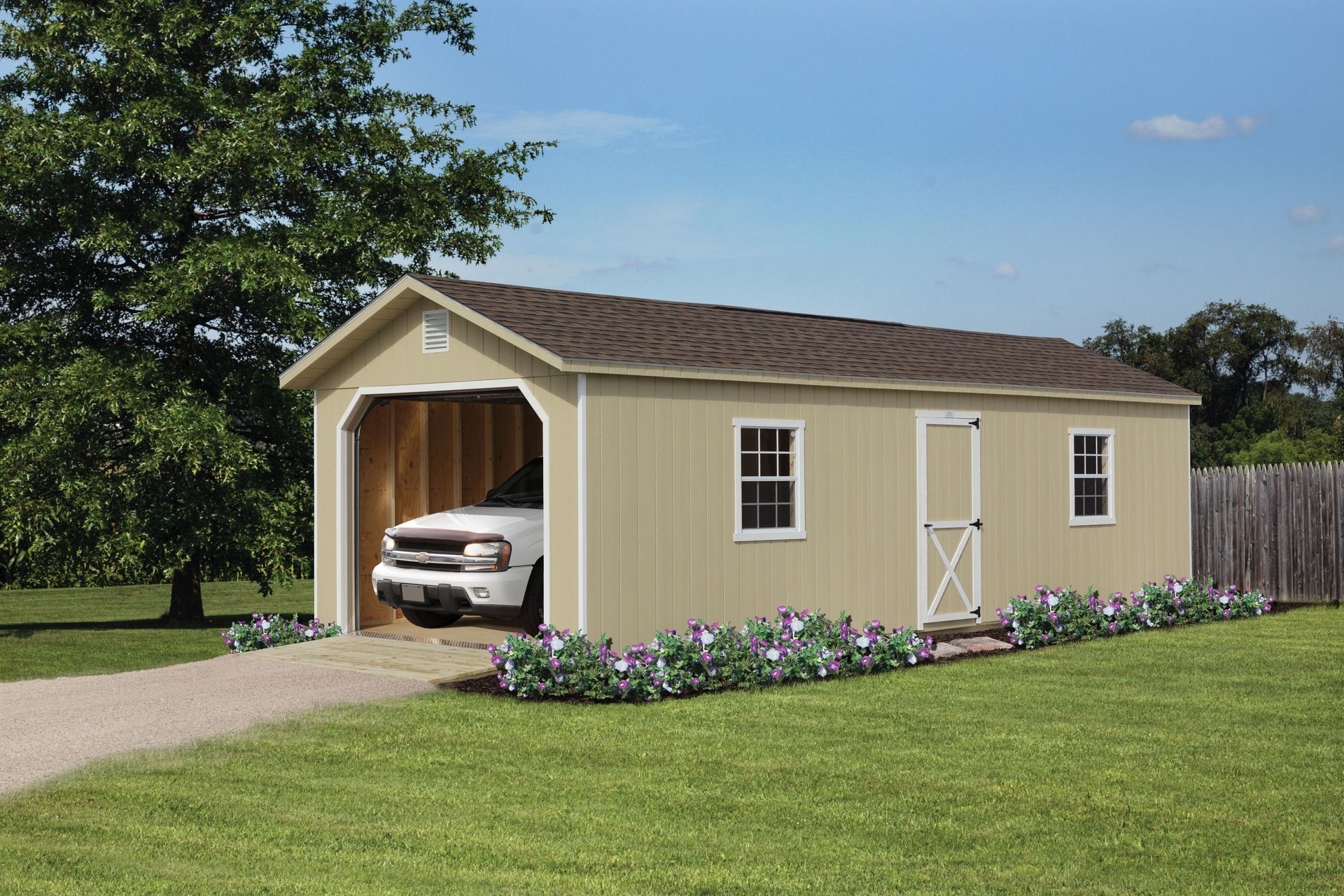 a white truck is parked in a garage .