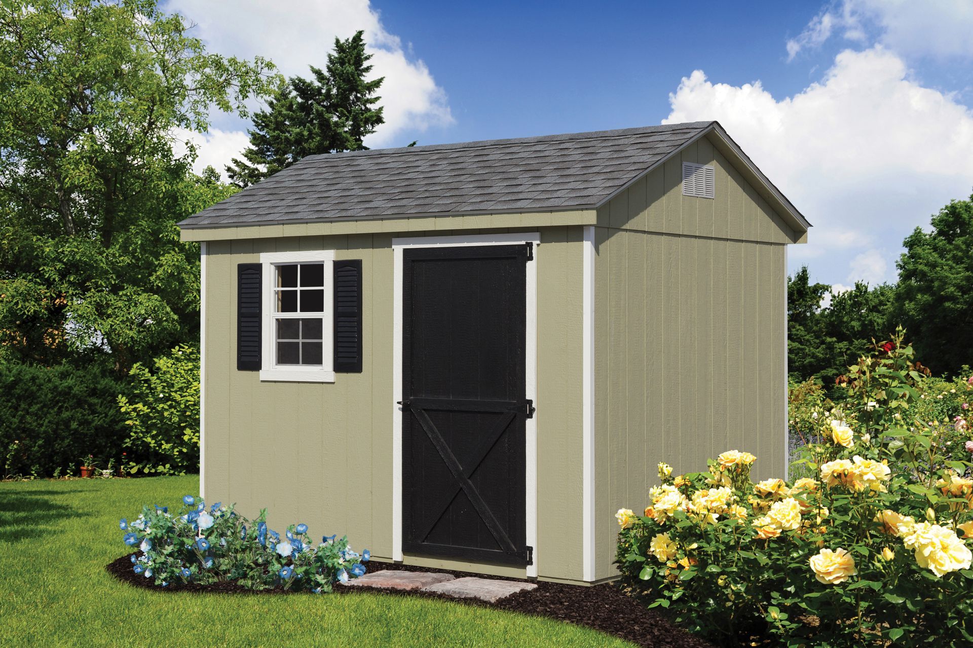 a small shed with a black door and shutters