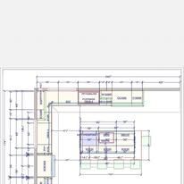 Floor plan of a kitchen with dimensions. Includes cabinets, island, and appliances.