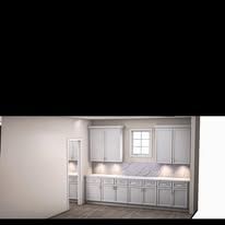 Kitchen with white cabinets, countertop, and window.