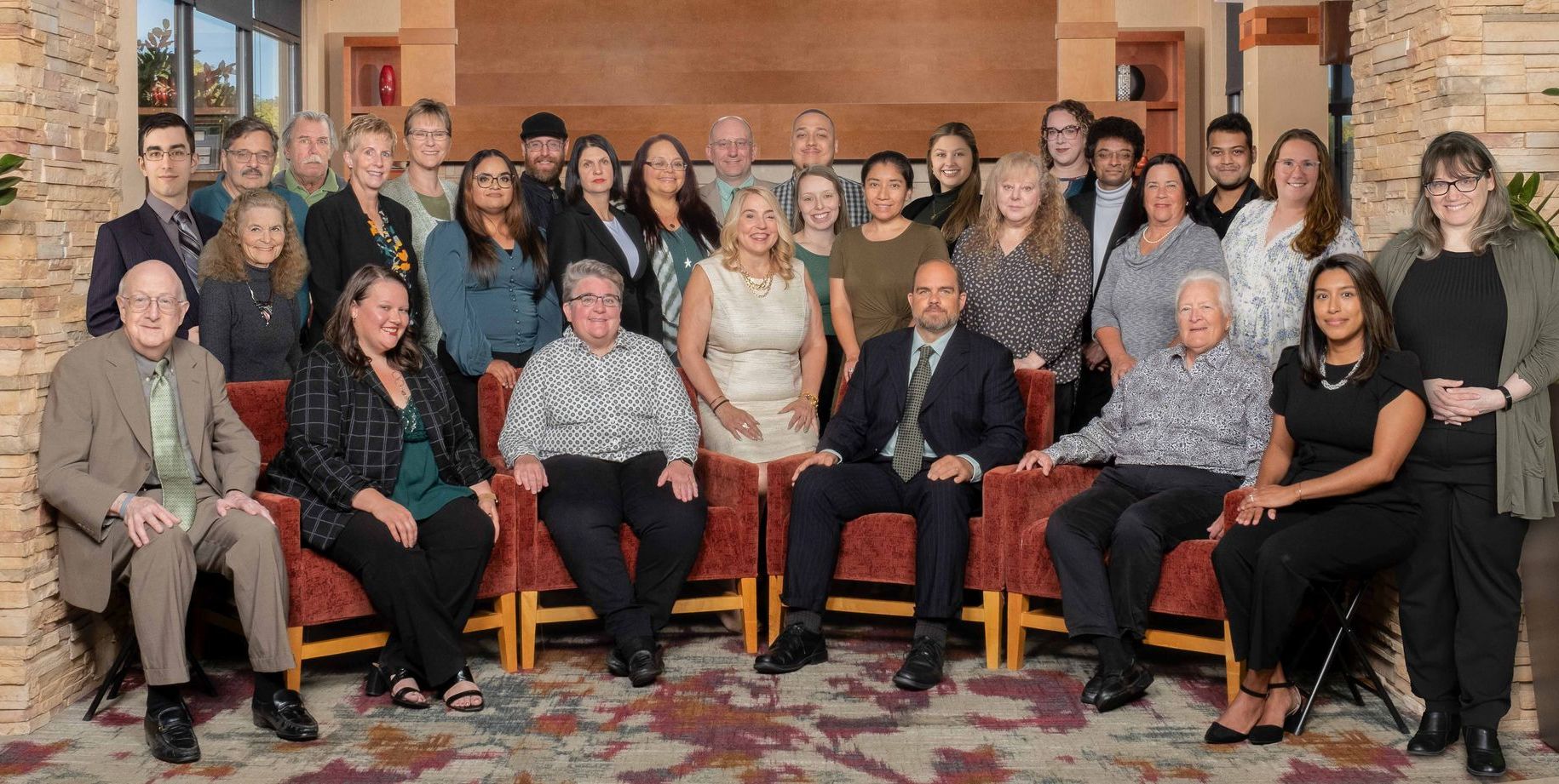 A large group of people are posing for a picture.