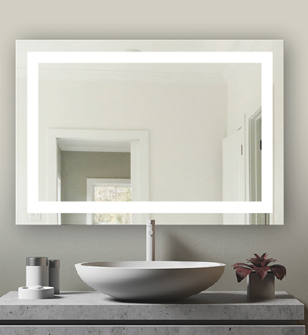 A bathroom with a sink and a mirror with a light on it.