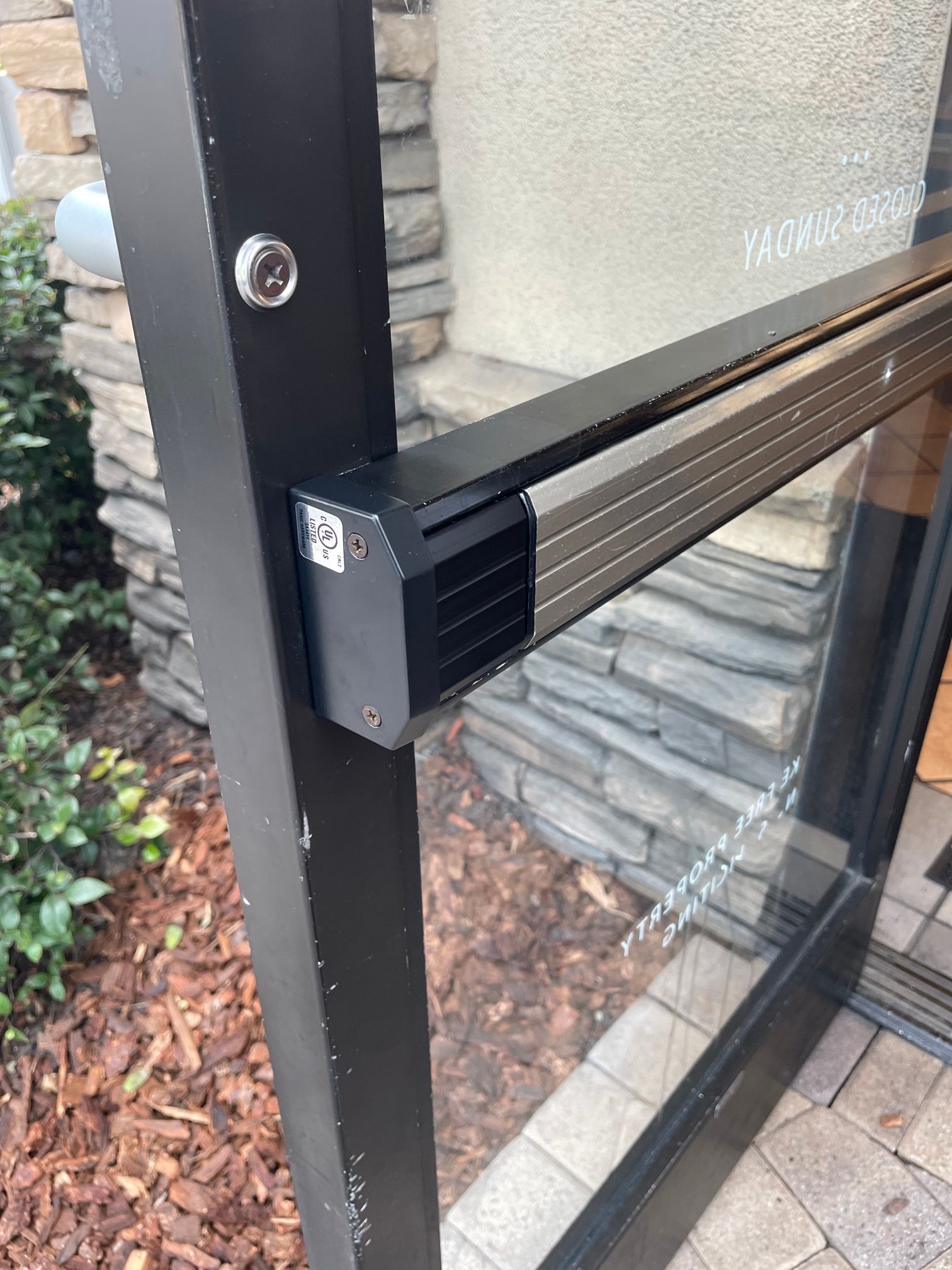 A close up of a door with a bar on it.