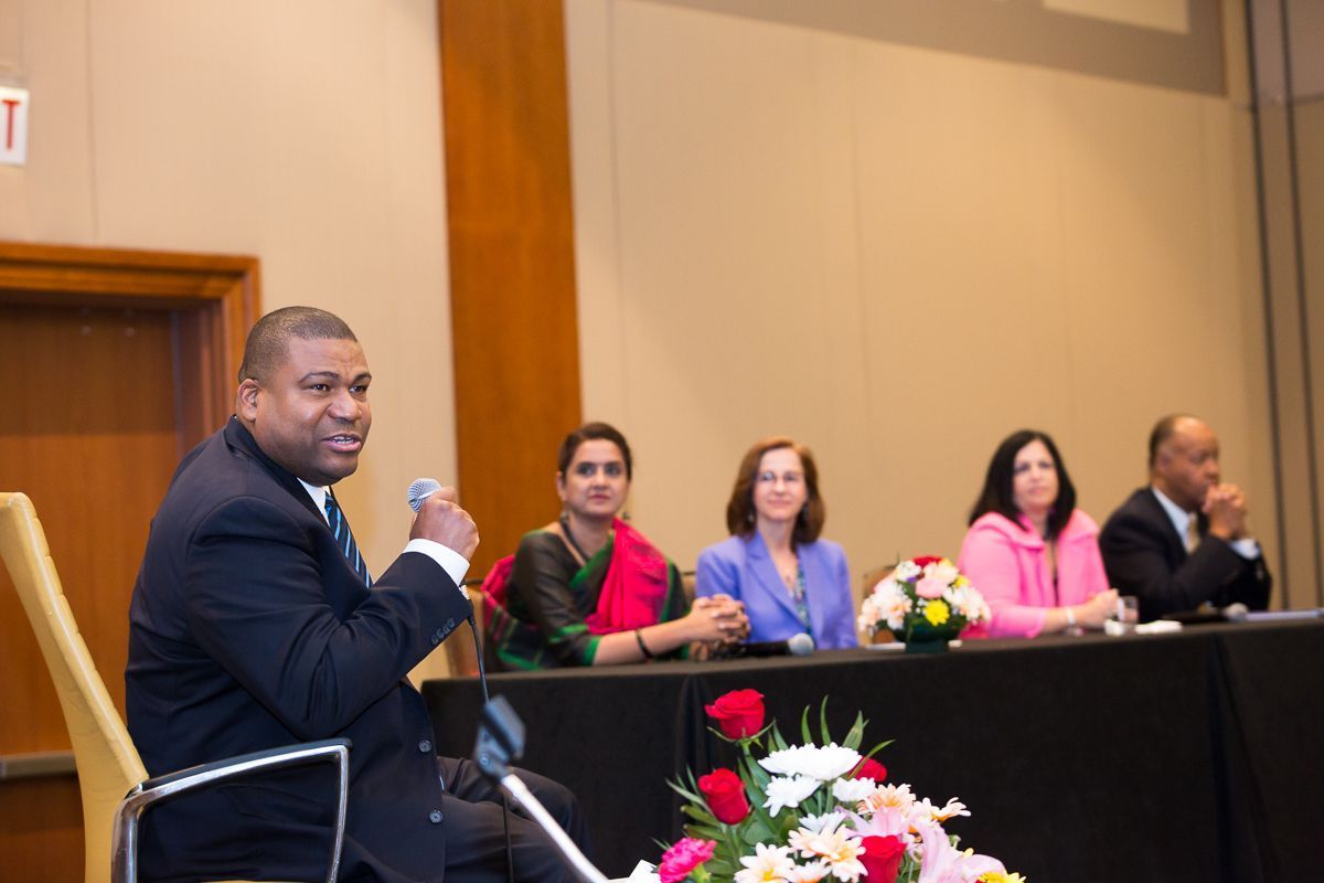 Derwin Smiley, CEO of the Society for Diversity, moderating a discussion on