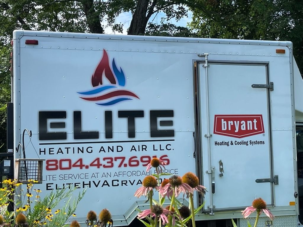 ELITE Heating and Air LLC service truck with Bryant logo and flowers in front