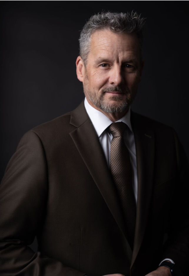 Photo of {{Team Member Name}}